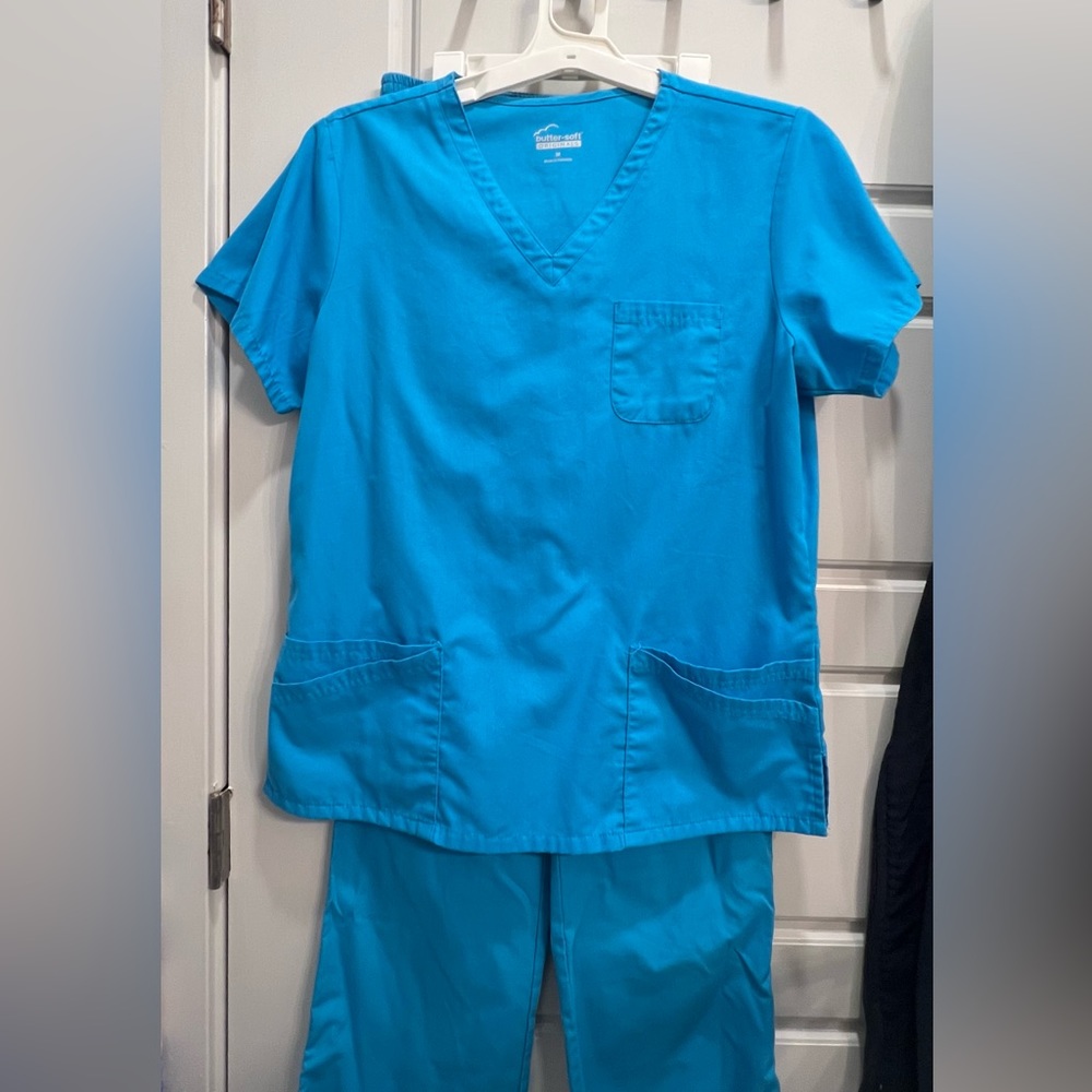 TWO SETS OF SCRUBS